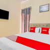 Отель SPOT ON 90526 New Bunga Sonsang Homestay Syariah, фото 8