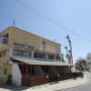 Отель Grecian Beach Apartment, фото 1