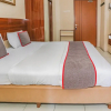 Отель Super OYO Capital O 93910 Asia Rooms @ Green Lake View Ciputat, фото 4