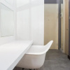Отель Clean and Tidy Studio Room at Tree Park Apartment, фото 13