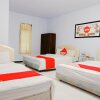 Отель OYO 421 Alianda Guest House Syariah, фото 2