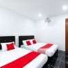 Отель OYO 44011 Weng Bee Guest House, фото 27