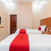 Отель Reddoorz Syariah Near Rs Mata Padang, фото 3