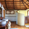 Отель Saadani Safari Lodge - bush, river, beach, фото 35