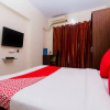 Отель OYO 12082 Om Apartment, фото 10