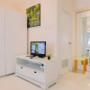 Отель Homey And Big Studio Apartment At The Wave Kuningan, фото 4