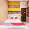 Отель OYO Flagship 3869 Metro House Sub, фото 3