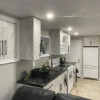 Отель Stunning & cozy freshly renovated 2 bedroom basement unit, фото 6