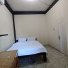 Отель OYO 93207 Merah House, фото 9
