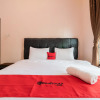 Отель RedDoorz Syariah at D'Ostha Residence, фото 5
