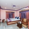 Отель OYO Flagship 10079 Rainbow Guest House, фото 13