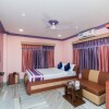 Отель OYO Flagship 10079 Rainbow Guest House, фото 19