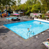 Отель Nice chalet with outdoor sauna and spa, in a holiday park, near the Veluwe, фото 3