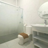 Отель Urbanview Hotel Mulia Indah Palopo, фото 7