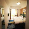 Отель Jining Boya Apartment Hotel, фото 1