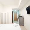 Отель Cozy And High Floor Studio Room At Vida View Makassar Apartment, фото 4