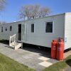 Отель Beautiful 3-bed Caravan Situated on Lakeland Haven, фото 1