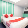 Отель OYO 128 d'Builders Rooms Phase 2, фото 6