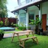 Отель Villa Prambanan Jogja with Private Swimming Pool by Simply Homy, фото 19
