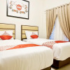 Отель Oyo 1076 Dmc Homestay, фото 8
