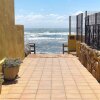 Отель Dona Lola Micaela Beach front duplex 2 bedroom apartment - open sea and beach views surrounded by ba, фото 11