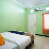 Отель Spot On 2729 Marzan Syariah Guest House, фото 4