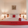 Отель Reddoorz Premium Near Jembatan Ampera 2, фото 6
