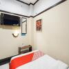 Отель OYO 3892 Athaya Guesthouse Syariah, фото 46