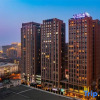 Отель Wutong Apartments Hotel, фото 1