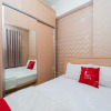 Отель RedLiving Apartemen Tamansari Panoramic - Rasya Room, фото 3