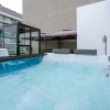 Отель Exclusive Penthouse With Private Rooftop Jacuzzi BBQ Game Room, фото 10