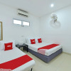 Отель OYO 90879 Eleven Inn, фото 9