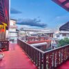 Отель Lijiang Xin Gui Zhu Boutique Inn, фото 3