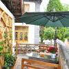 Отель Lijiang Xunniuge Guest House, фото 19