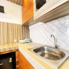 Отель Homey Designed And Cozy 2Br At Mekarwangi Square Cibaduyut Apartment, фото 6