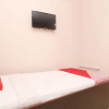 Отель OYO 30274 Temple City Guest House, фото 18
