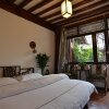 Отель Lijiang Ancient Town International Youth Hostel, фото 6