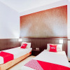 Отель OYO Homes 91083 Desa Wisata Plosokuning Syariah, фото 3