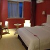 Отель Kunlun Leju Business Hotel в Чжэнчжоу