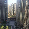 Отель Manxin Louzhu Apartment, фото 1