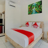 Отель OYO 90337 Wiguna Homestay, фото 14