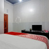 Отель OYO 90358 Poris Residence, фото 2