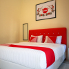 Отель OYO 2202 Delima Guest House Syariah, фото 2