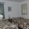 Отель Motel Beaver Pond, фото 1