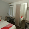 Отель OYO 92318 Elis Rooms, фото 6