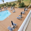 Отель Galvestonian 112 - Beachfront Hideaway, фото 16