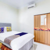 Отель SPOT ON 94007 Homestay Putra Syariah, фото 6