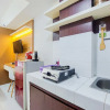 Отель Homey And Elegant Studio Amazana Serpong Apartment, фото 10