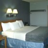 Отель Quails Nest Inn and Suites в Осейдж-Биче
