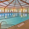 Отель Poconos Home w/ Pool Access ~ 6 Mi to Ski Resort в Лонг Понд